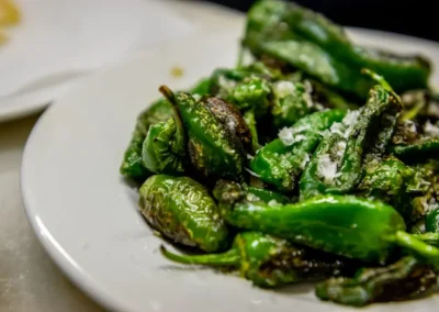 Close up of padron peppers on a plate